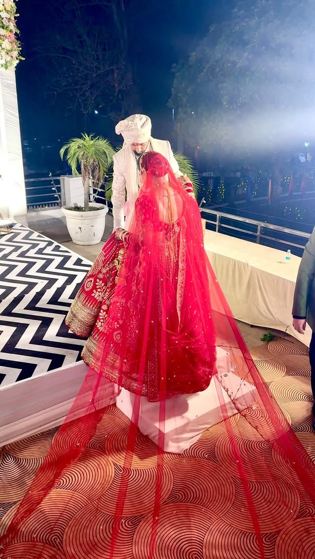 Sorry if you see me a little extra happy, a little extra giggly, a little extra crying or a little extra cheesy. I just Got married to the Man of my Dreams. ❤️🥂🪬 Thank youuuu to whoever captured this moment through my phone. Now I know This is how he looked at me 😌🫠❤️ by @yoga_with_yukti