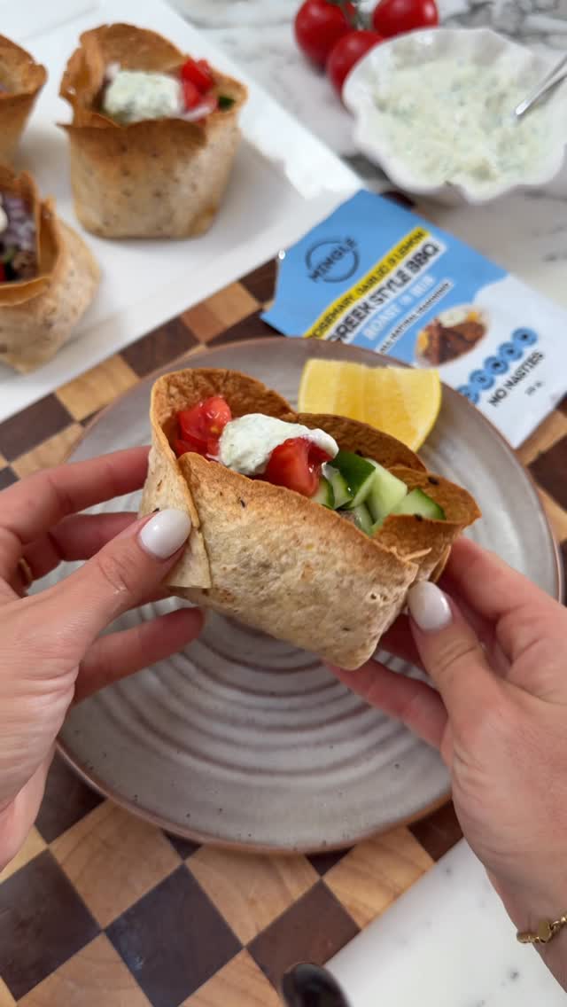 GREEK LAMB TORTILLA BOWLS 🔥 Using @mingleseasoning Greek Style BBQ Rub! Serves 4Ingredients:Tortilla Bowls:4 medium tortillasOlive oil spray1 tsp Greek Style BBQ RubGreek Lamb Filling:500g lean lamb mince1.5 tbsp Greek Style BBQ Rub1 garlic clove, crushedOlive oil spraySalad & Toppings:1 cup chopped tomato1 Lebanese cucumber, diced¼ red onion, finely sliced½ lemon½ cup tzatziki (homemade)1 tsp Greek Style BBQ RubFresh parsley or mint, optionalMethod:1. Preheat oven to 190°C.2. Lightly microwave the tortillas between damp paper towel for 30 seconds until soft and pliable.3. Add 1 tsp of Greek Style BBQ Rub to melted butter and brush over the tortilla. 4. Cut into the tortillas (as per the video) and fold to create bowl shapes. Secure with toothpicks if needed. 5. Bake for 10-15 minutes, or until deeply golden and crispy. Remove carefully and allow to cool slightly - they crisp up even more as they cool.6. Meanwhile, spray a pan with olive oil and place over medium-high heat. Add the garlic, lamb mince and Greek Style BBQ Rub. Cook for 6–8 minutes, breaking up the mince until browned and slightly crispy.7. Add 1 tsp of Mingle Greek Style BBQ Rub to the tzatziki 8. Fill each tortilla bowl with the Greek lamb mince. Top with tomato, cucumber and red onion.9. Spoon over tzatziki, squeeze over fresh lemon juice and finish with parsley or mint if using. by @recipesbyvictoria