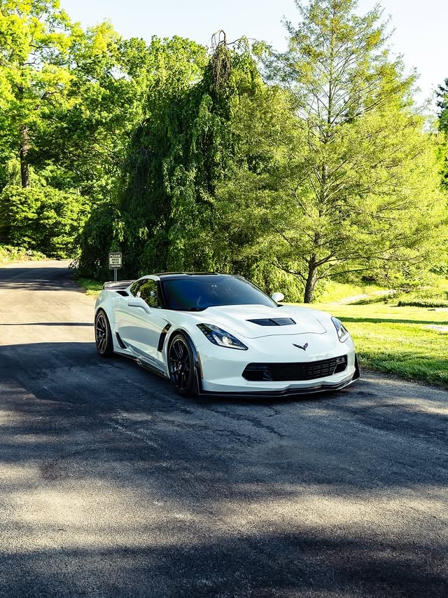 Nathan’s C7 Z06 Finished in Arctic White with plenty of carbon fiber accents, placed on a set of @forgeline GS1R wheels, with a pair of @mickeythompsontires (ET Street R’s) on the rear, and lowered just a touch. In my opinion, the C7 Z06 is the perfect blend of performance, driver-focused engineering, value for the money, overall styling, and everyday usability.The Z06 trim of the C7 Corvette is powered by a LT4 6.2L Supercharged V8 making 650hp and 650 ft-lbs of torque (as shown on the plaque in slide 13). This one however has upgraded headers, ported heads, Kong ported blower, and has been cammed - it now makes roughly 730hp to the wheels. #c7 #z06 #z07package #manual #v8 by @forgeline
