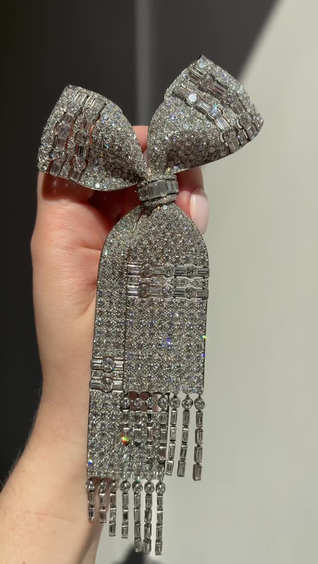 Celebrated for their timeless femininity, ribbon and bow motif jewels have long held a cherished place in the history of jewelry. Far from a passing trend, this motif has deep roots emerging in the 17th century European court culture and was continually reinterpreted through the romantic jewels of the Victorian era, the Belle Époque, the Edwardian period and beyond. During the Art Deco period, bow brooches were reimagined in line with the era’s emphasis on modernity and geometric form. Designs became more stylized and architectural, often in platinum and pavé-set diamonds, occasionally accented calibré-cut colored stones. While early Art Deco jewels combined colored gemstones and diamonds, the later period favored all white compositions with diamonds as the signature gemstone.The present brooch dates to the end of the Art Deco era. The round and baguette-cut diamonds, asymmetrical silhouette and double-banded ornamentation exemplify the exceptional craftsmanship and the geometric elegance of the period. Lot 107: AN ELEGANT ART DECO DIAMOND BOW BROOCHEstimate: 80,000 – 120,000 Magnificent Jewels | New York | 9 June #christies #christiesjewels by @christiesjewels