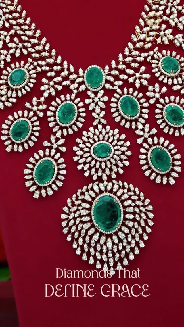 💚 Diamonds That Define Grace. Emeralds That Command Royalty.Every diamond tells a story—make yours unforgettable. ✨Step into the spotlight with this ultimate masterpiece of bridal luxury. This heavy, intricately handcrafted diamond bib necklace features a breathtaking floral lattice of premium sparkling diamonds, dramatically contrasted by a symmetrical layout of rich, vivid green oval emeralds. Complete with matching emerald-cut statement chandelier earrings featuring delicate diamond fringes, this set is designed for the modern queen who commands the room. 👑💎 The Masterpiece HighlightsNecklace Design: Intricate diamond floral/leafy bib necklace adorned with premium oval-cut emeralds.Earrings: High-glam, matching emerald-cut center stones with cascading diamond tassels.Aesthetic: Seamless blend of timeless heritage charm and high-end contemporary sparkle.📍 Visit Us / Order OnlineDiscover exclusive bridal and high-jewelry designs at your nearest showroom or reach out directly to consult with our jewelry experts:Showrooms: Vijayawada | Hyderabad | Kakinada | Eluru | Guntur🌐 vegajewellers.com📞 +91 99899 43625#VegaJewellers #DiamondEmeraldSet #EmeraldNecklace #DiamondHaram #BridalJewelleryHyderabad #VijayawadaJewellers #GunturLuxury #KakinadaFashion #EluruJewellers #SouthIndianBride #ReelTrends #LuxuryJewelry by @vegajewellers_jubileehills